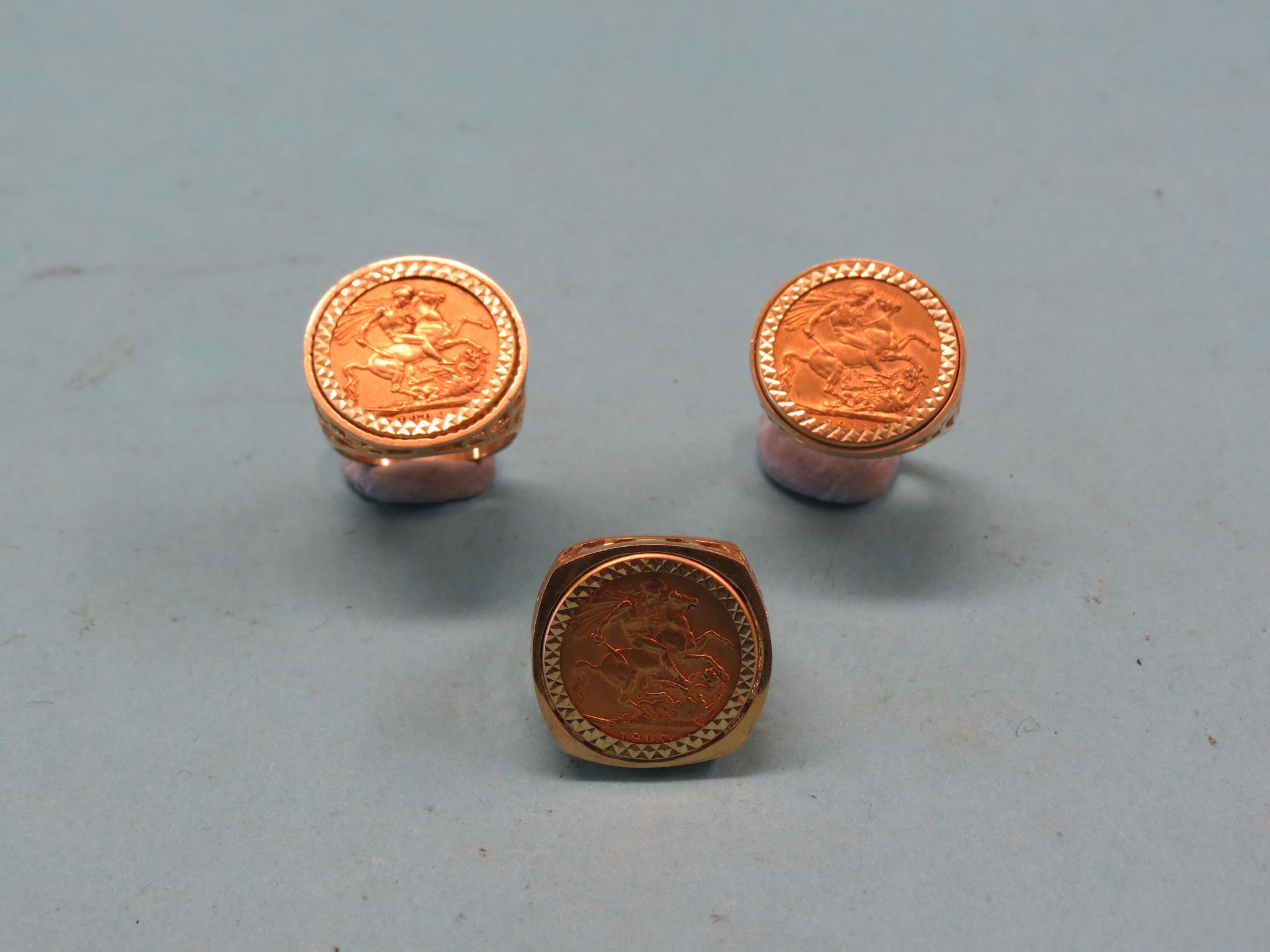 Appraisal: Three gold sovereigns each within ct gold ring mount