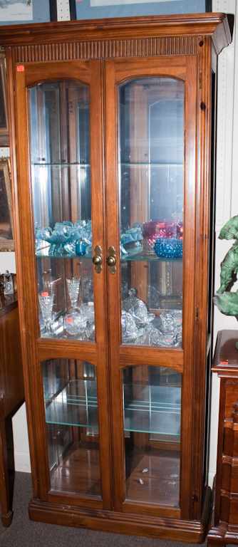 Appraisal: Fruitwood and glass curio cabinet Estimate - All property is