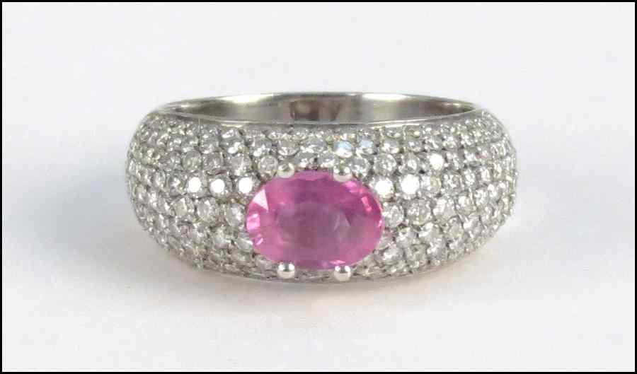 Appraisal: WHITE GOLD DIAMOND AND PINK SAPPHIRE SOLITARE RING Oval sapphire