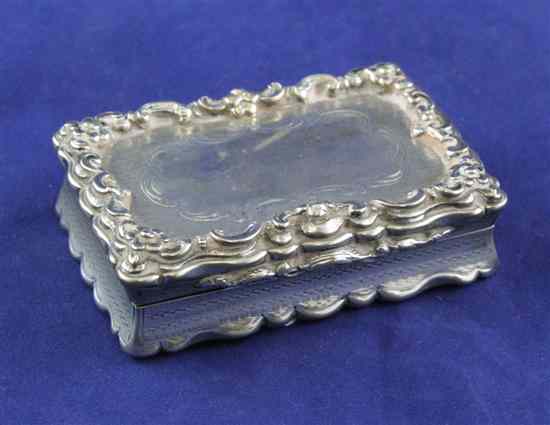 Appraisal: A Victorian engine turned silver table snuff box of shaped