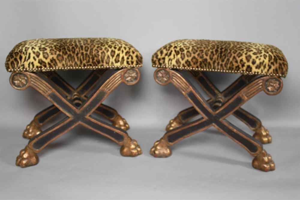 Appraisal: PAIR OF EBONIZED AND PARCEL GILT DENNIS LEEN FAUX LEOPARD