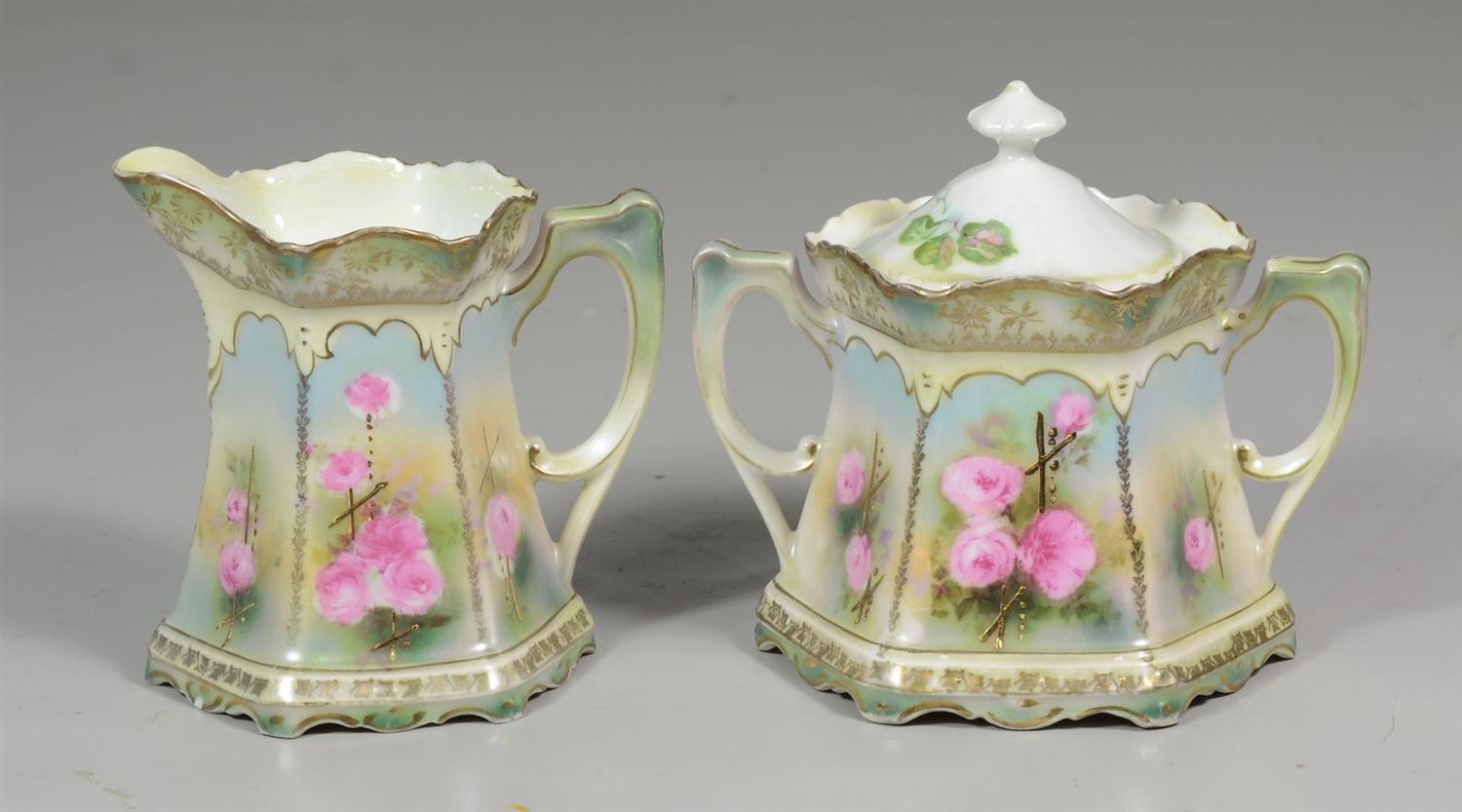 Appraisal: RS Prussia porcelain sugar and creamer art nouveau handles signature