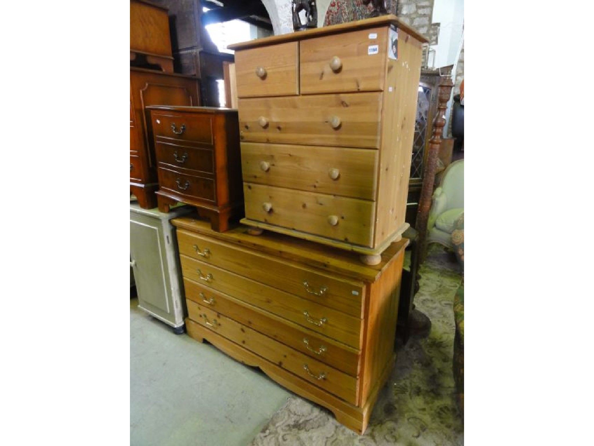 Appraisal: A small contemporary stripped pine bedroom chest of three long