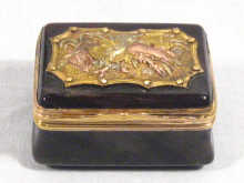 Appraisal: A pudding stone box with a vari coloured applied gold