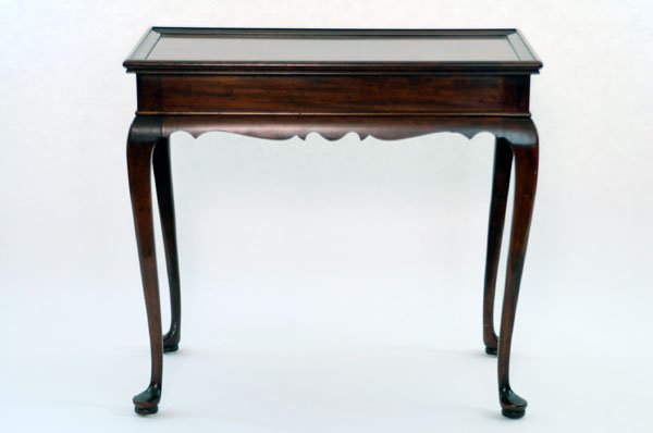 Appraisal: Queen Anne style tea table with a molded top Shaped