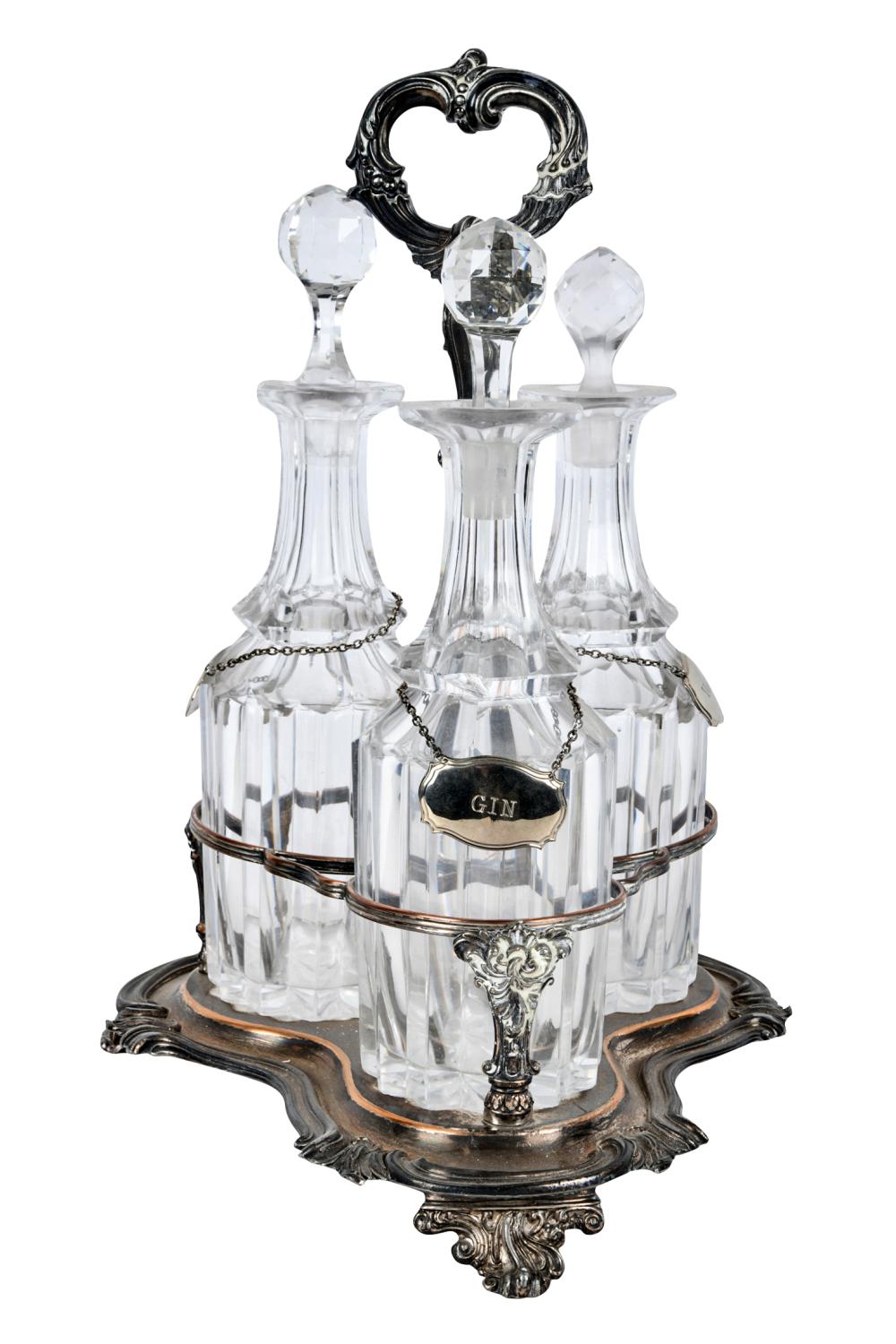 Appraisal: GLASS SILVERPLATE TANTALUSunmarked with three bottles Condition with repair to