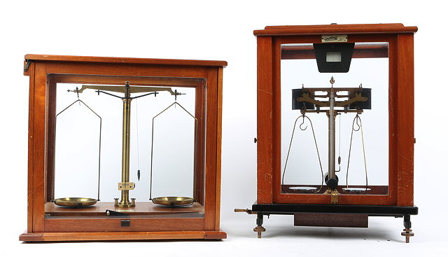 Appraisal: A SET OF MAHOGANY CASED LABORATORY SCALES by F E