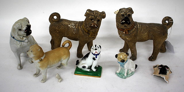 Appraisal: A GROUP OF VARIOUS CONTINENTAL PORCELAIN AND POTTERY PUG DOGS