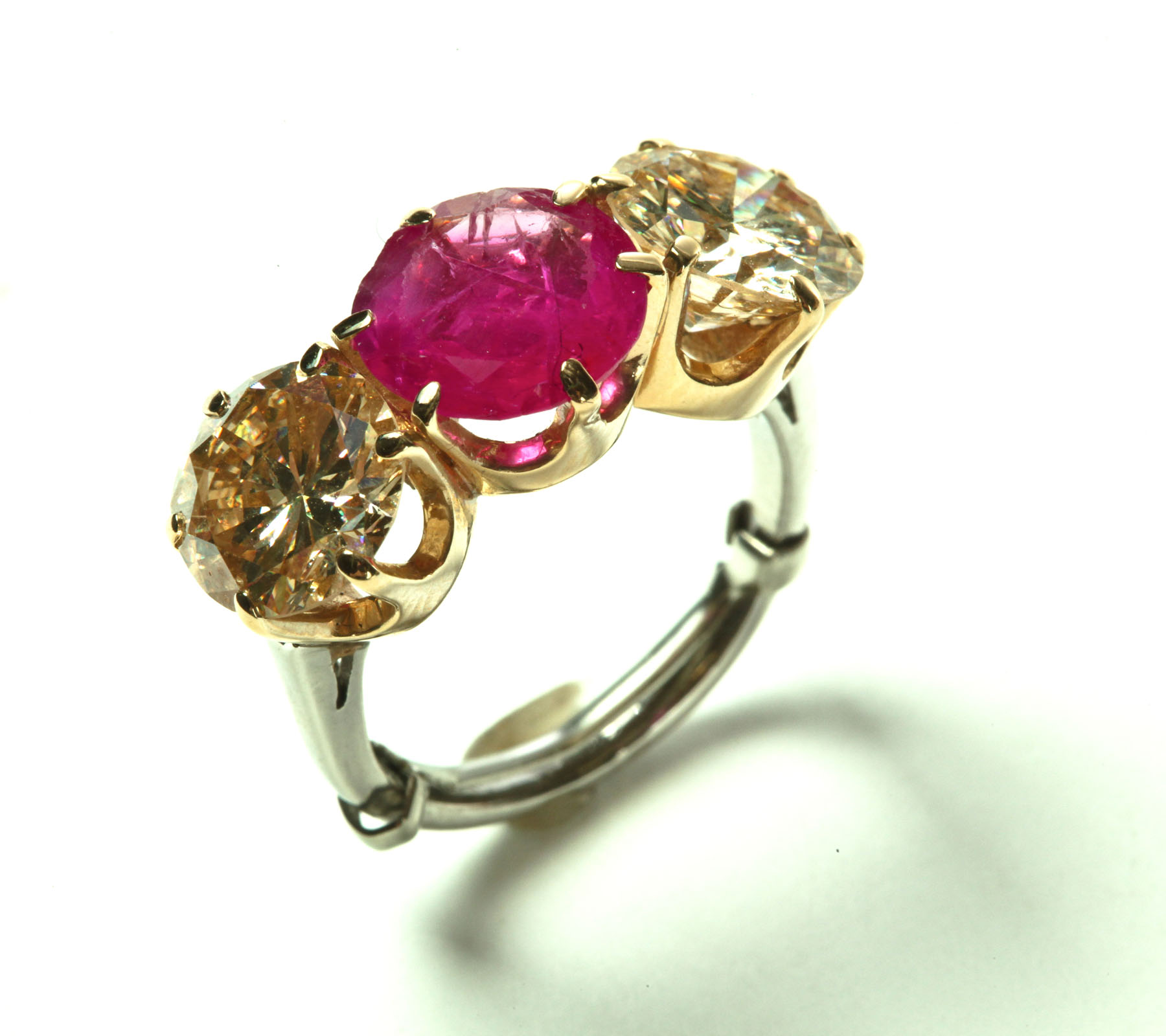 Appraisal: RUBY AND DIAMOND RING Twentieth century Central ruby x mm