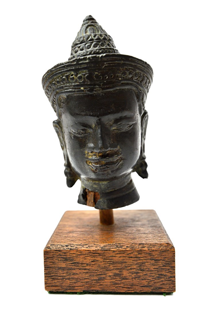 Appraisal: A small Khmer bronze head of buddha Angkor Wat style