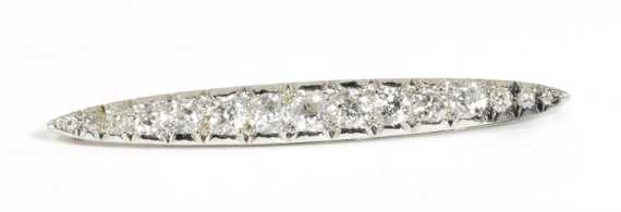 Appraisal: DIAMOND BAR BROOCH ca Platinum Decorative slightly spindle-shaped bar brooch