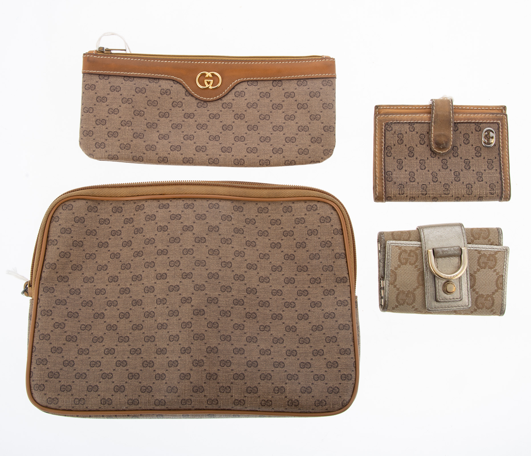 Appraisal: FOUR GUCCI MONOGRAM CANVAS ACCESSORIES including a pouch pen pencil