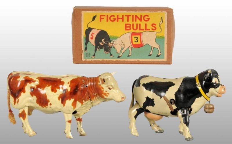 Appraisal: Lot of Tin Bull Cow Wind-Up Toys Description German and