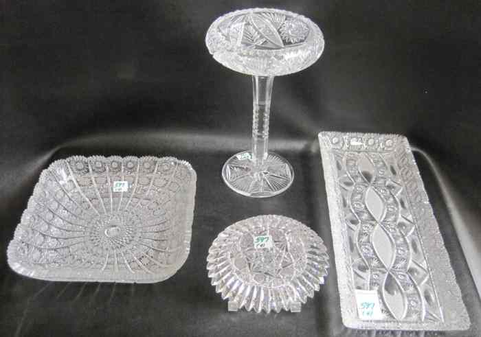 Appraisal: FOUR PIECES HAND CUT AND ENGRAVED GLASS heavy hors d'oeuvre