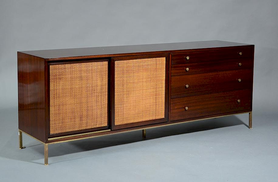 Appraisal: Harvey Probber Sideboard Harvey Probber sideboard with sliding cane doors