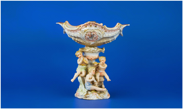 Appraisal: Volkstedt Centrepiece c with putti playing music inches in height