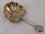 Appraisal: A silver caddy spoon the shell bowl with floral decoration