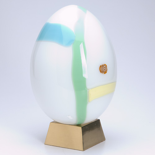 Appraisal: LINO TAGLIAPIETRA Blown glass egg on brass base Signed and