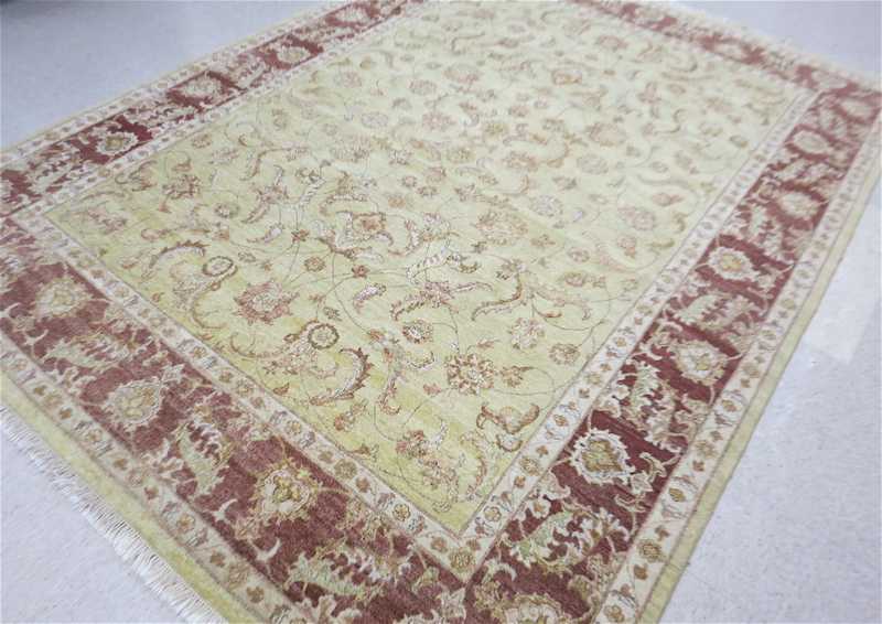 Appraisal: HAND KNOTTED ORIENTAL CARPET Pakistani Persian Isfahan design of scrolling