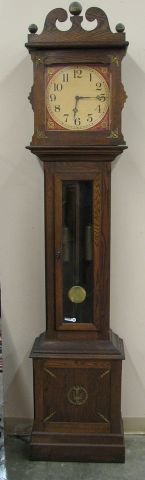 Appraisal: Early American style grandfather clock in oak case cast weights