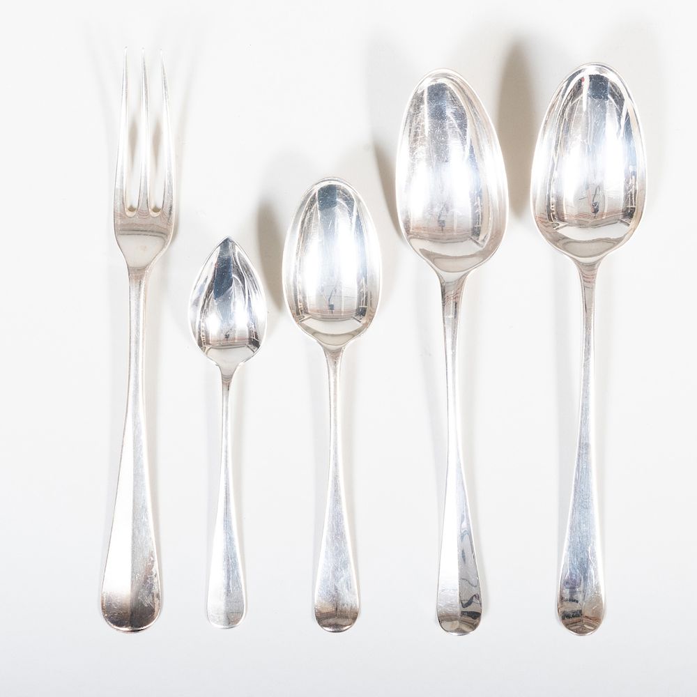 Appraisal: Assembled Set of British Silver Flatware Comprising Four large Georgian