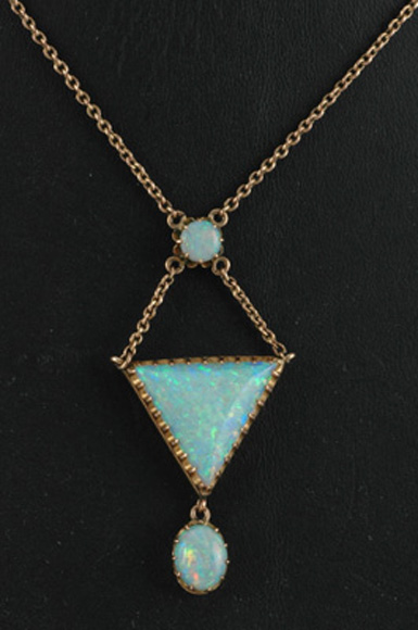 Appraisal: An Edwardian opal necklace Comprising three solid white opals mounted