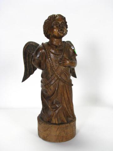 Appraisal: Carved wooden angel figure rustic style '' high