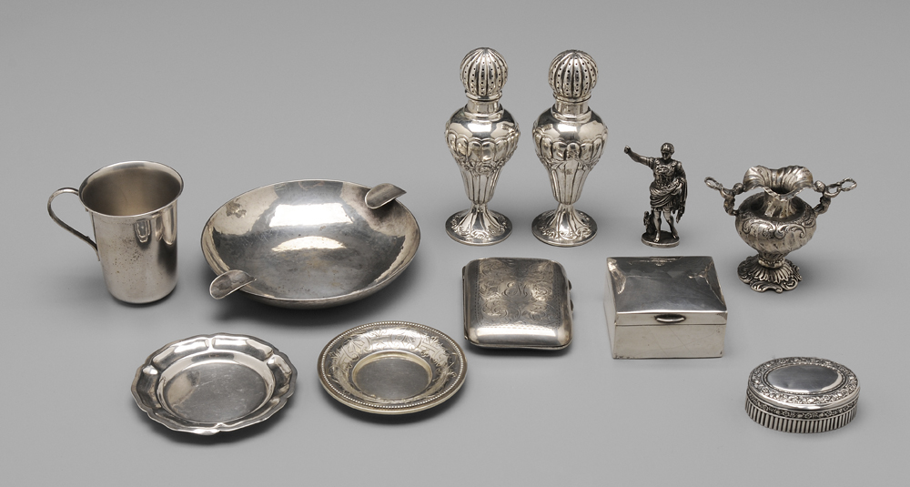 Appraisal: Assorted Silver Items includes Austrian saucer English silver case Mexican