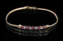 Appraisal: A Ladies' Gold Bracelet with Diamonds and Rubies k yellow