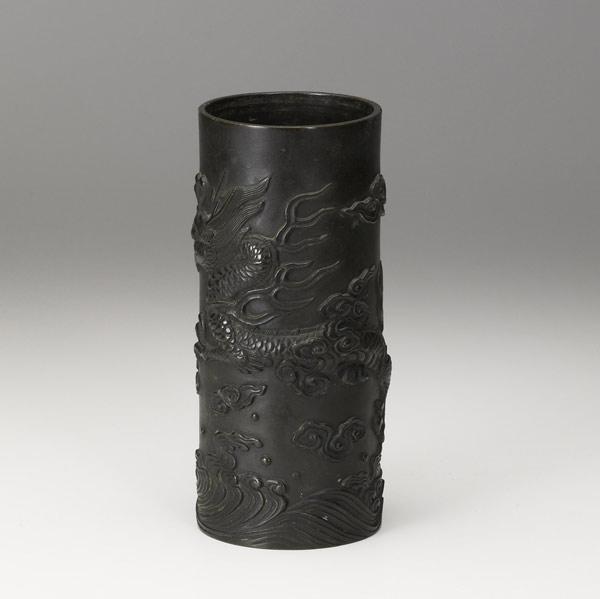 Appraisal: CHINESE BRONZE Cylindrical vase with relief dragon decoration