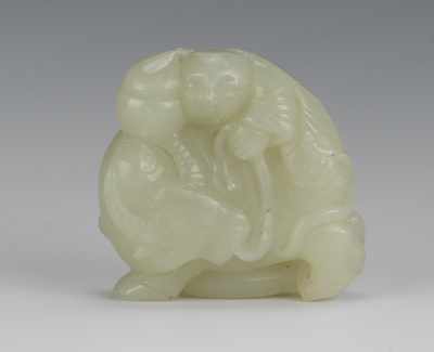 Appraisal: A Carved Jade Ornament of a Boy Riding an Ox