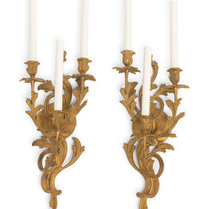 Appraisal: A Pair of Louis XV Style Gilt Bronze Three-Light Sconces