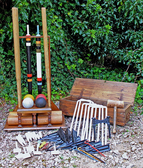 Appraisal: AN EARLY TH CENTURY SLAZENGER CROQUET SET with a wooden