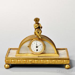 Appraisal: Gilt-metal and Mother-of-pearl Desk Clock Paris a cherub seating atop