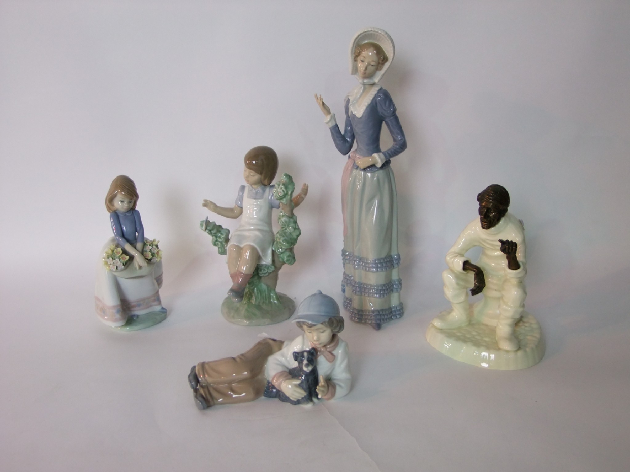 Appraisal: Two Lladro Daisa figures one of a young woman in