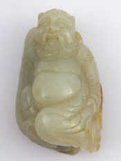 Appraisal: A Chinese jade figure of a bearded man on his