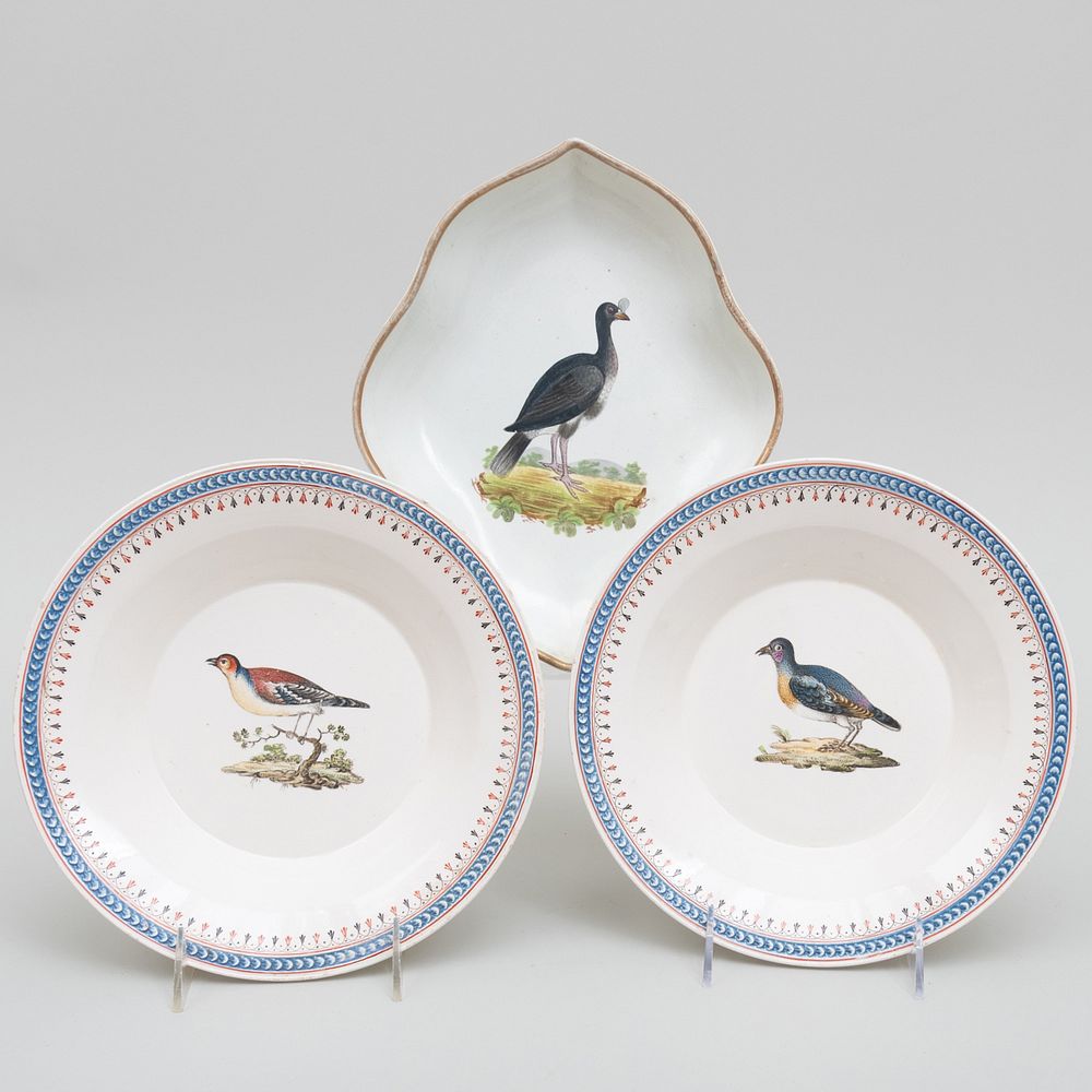 Appraisal: Pair of Creamware Soup Plates Decorated with Birds Probably Dutch