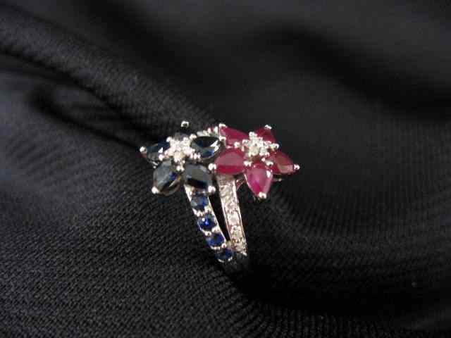 Appraisal: Ruby Sapphire Ring floral style setting with rich gems and