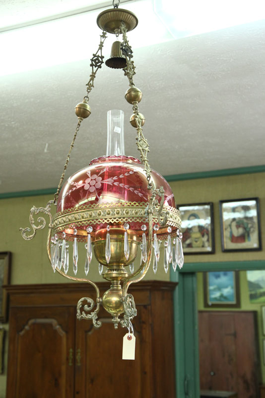 Appraisal: HANGING LIGHT Brass with double burner cranberry flashed shade and