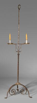 Appraisal: Miniature wrought iron candle stand finely wrought with two candle