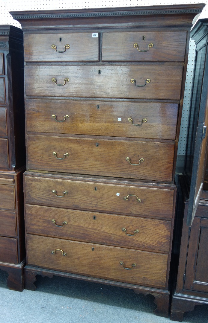 Appraisal: A George III oak chest on chest the dental cornice