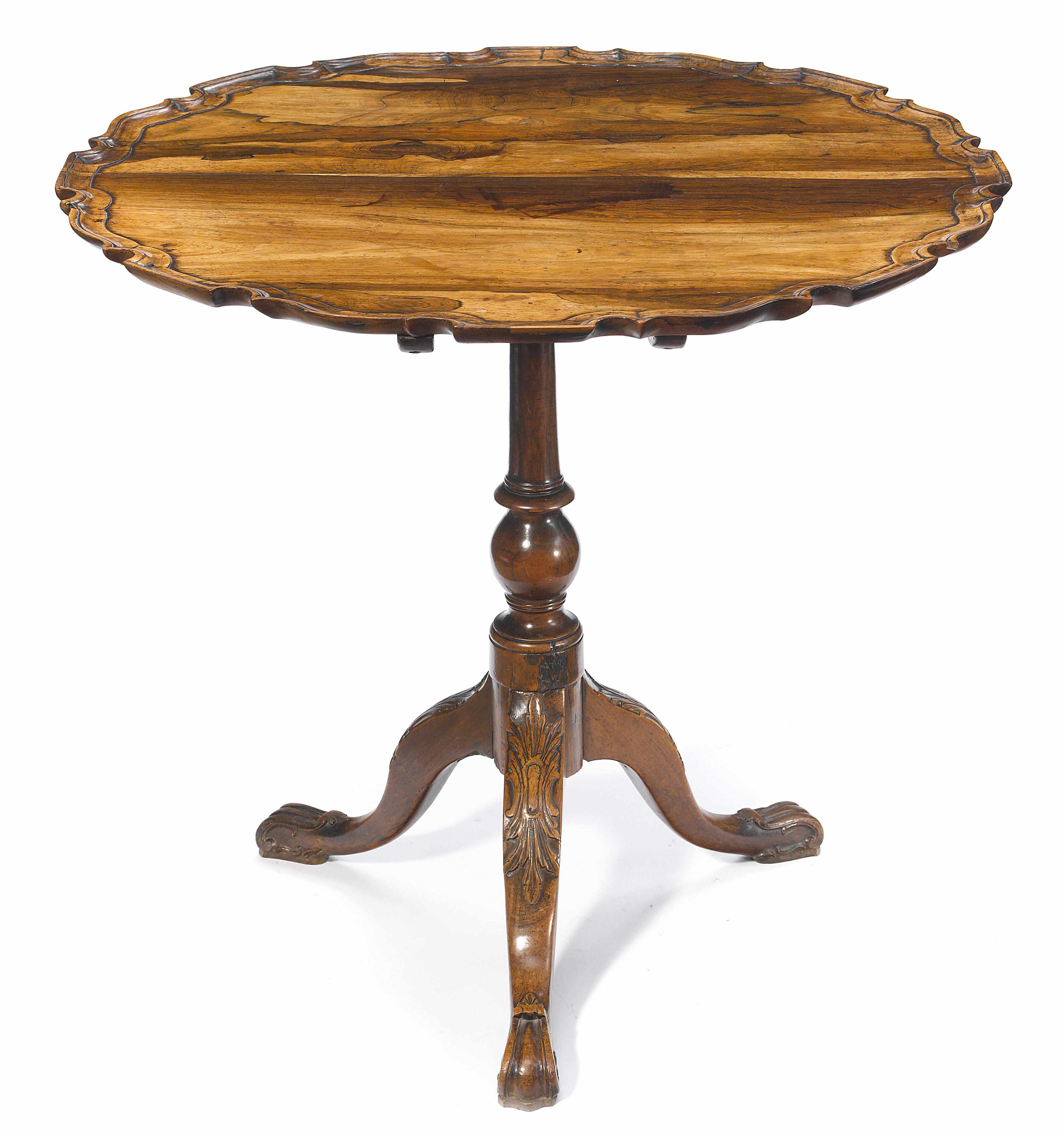 Appraisal: An unusual George III carved rosewood occasional table possibly Colonial