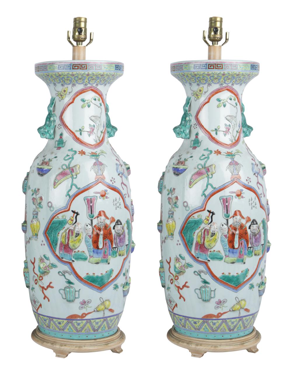 Appraisal: PAIR OF CHINESE PORCELAIN VASESeach with painted and relief-molded decoration