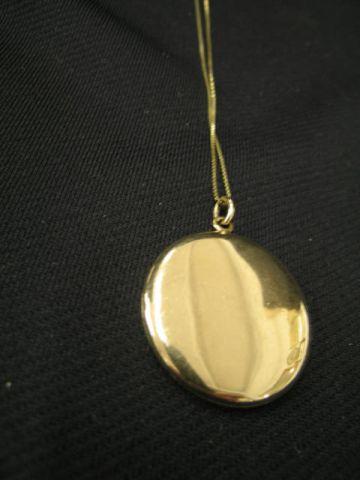 Appraisal: k Gold Chain with Gold-Filled Locket