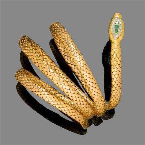 Appraisal: GOLD EMERALD AND DIAMOND BRACELET ca Yellow gold g Attractive