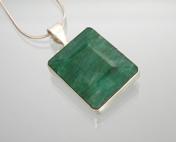 Appraisal: A Ladies' Emerald and Silver Pendant with Chain A simplified