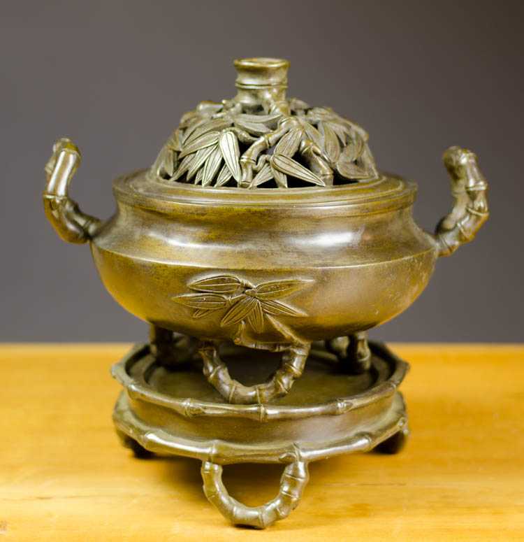 Appraisal: CHINESE BRONZE CENSER tri-footed with conforming tri-foot removable base the