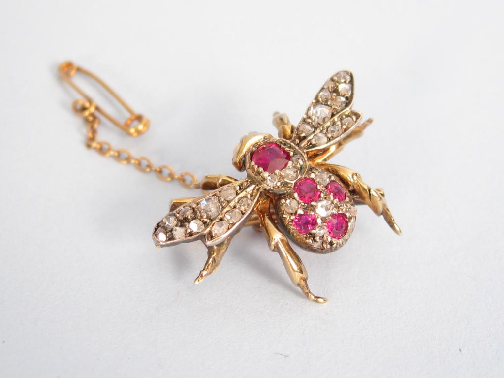 Appraisal: A Ruby and Diamond Insect Brooch set five circular-cut rubies