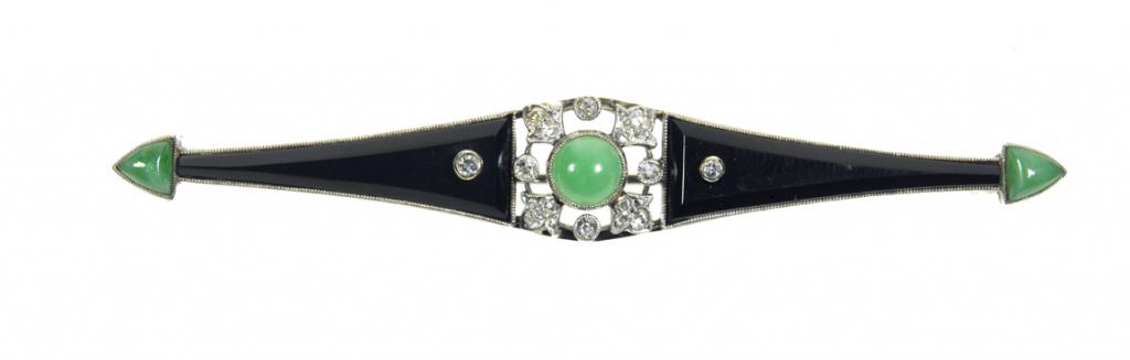 Appraisal: AN ART DECO JADE DIAMOND AND ONYX BROOCH millegrain set