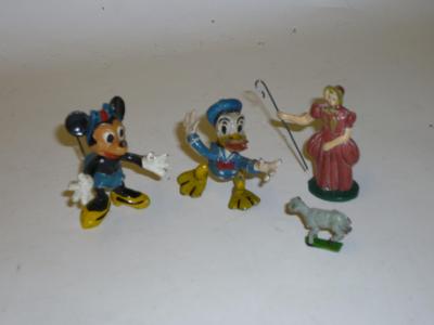 Appraisal: Two metal figures Minnie Mouse and Donald Duck high and